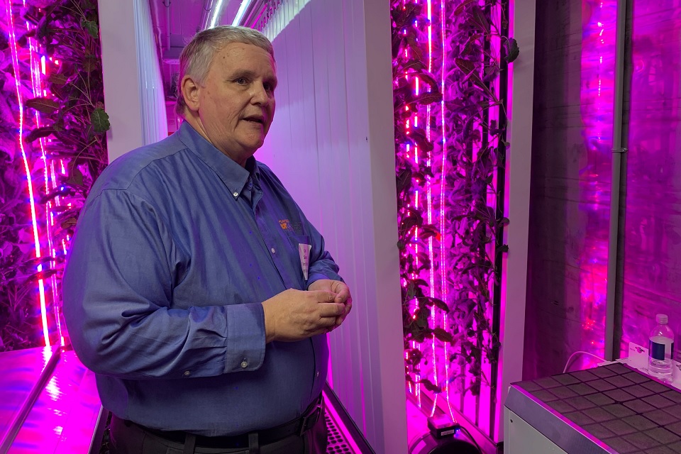 Picture of Carl Sams in the fresh electric farm