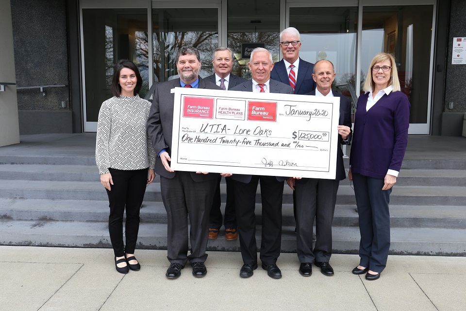 UTIA and Tennessee Farm Bureau Leaders holding Gift Check