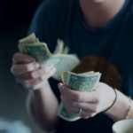 Picture of person counting money