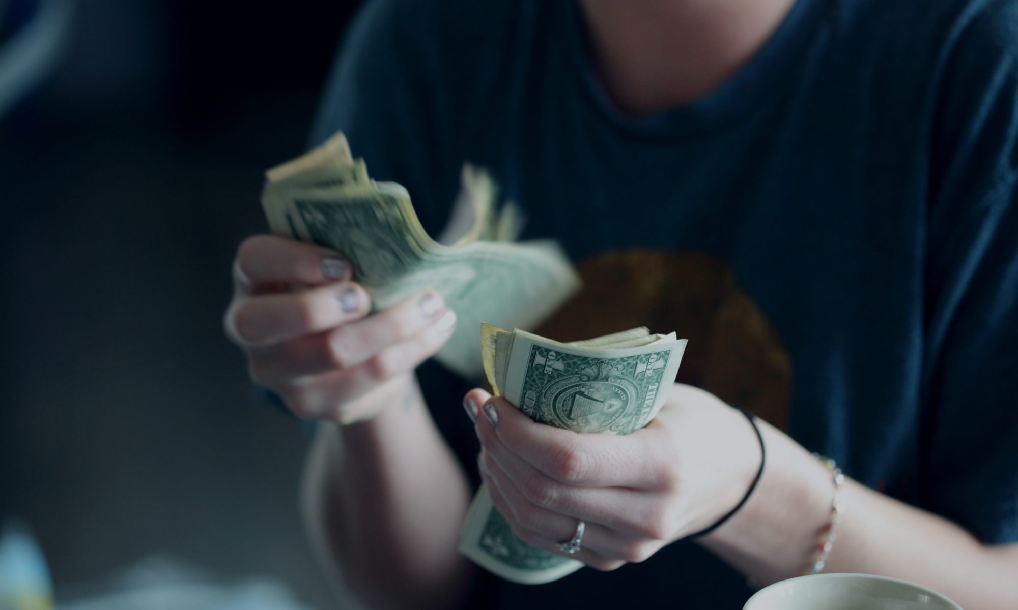 Picture of person counting money