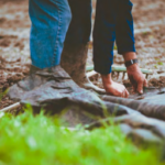 Picture of a person laying down biodegradable mulch