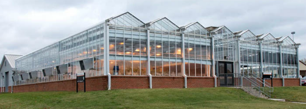 The sprawling glass and brick North Greehouse of the UTIA facility 